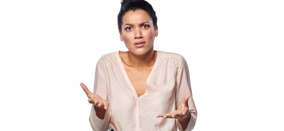 An attractive women with a puzzled expressing as if she is asking why me.