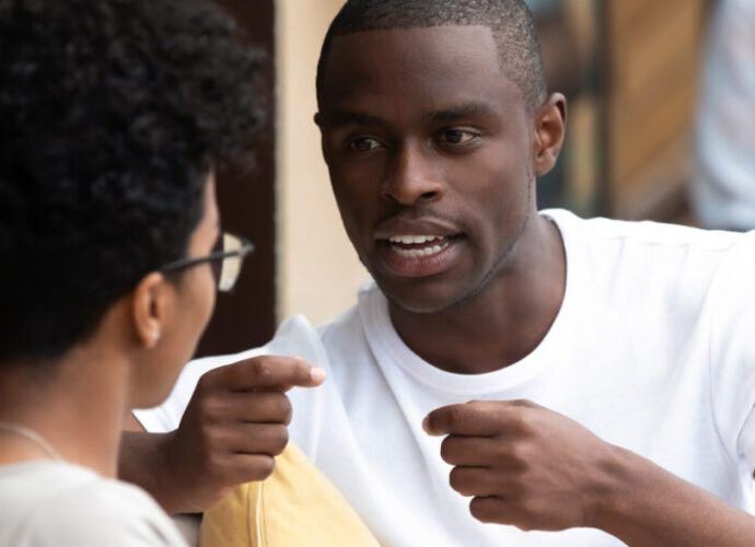 man and women in a conversation