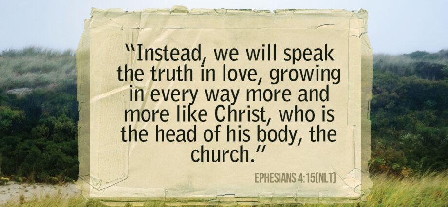 mountain and green grass landscape. Ephesians 4:15 nlt written across it.