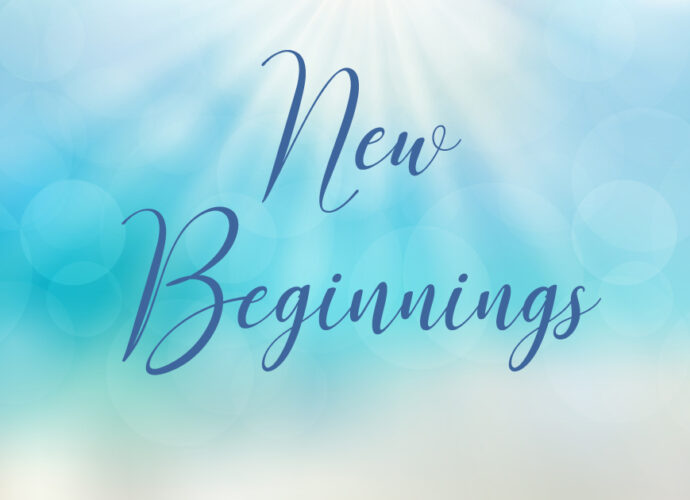 Beautiful sunlit ocean blue sky background with the words New Beginnings written across
